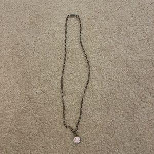 Cute pink preppy smiley face necklace!
